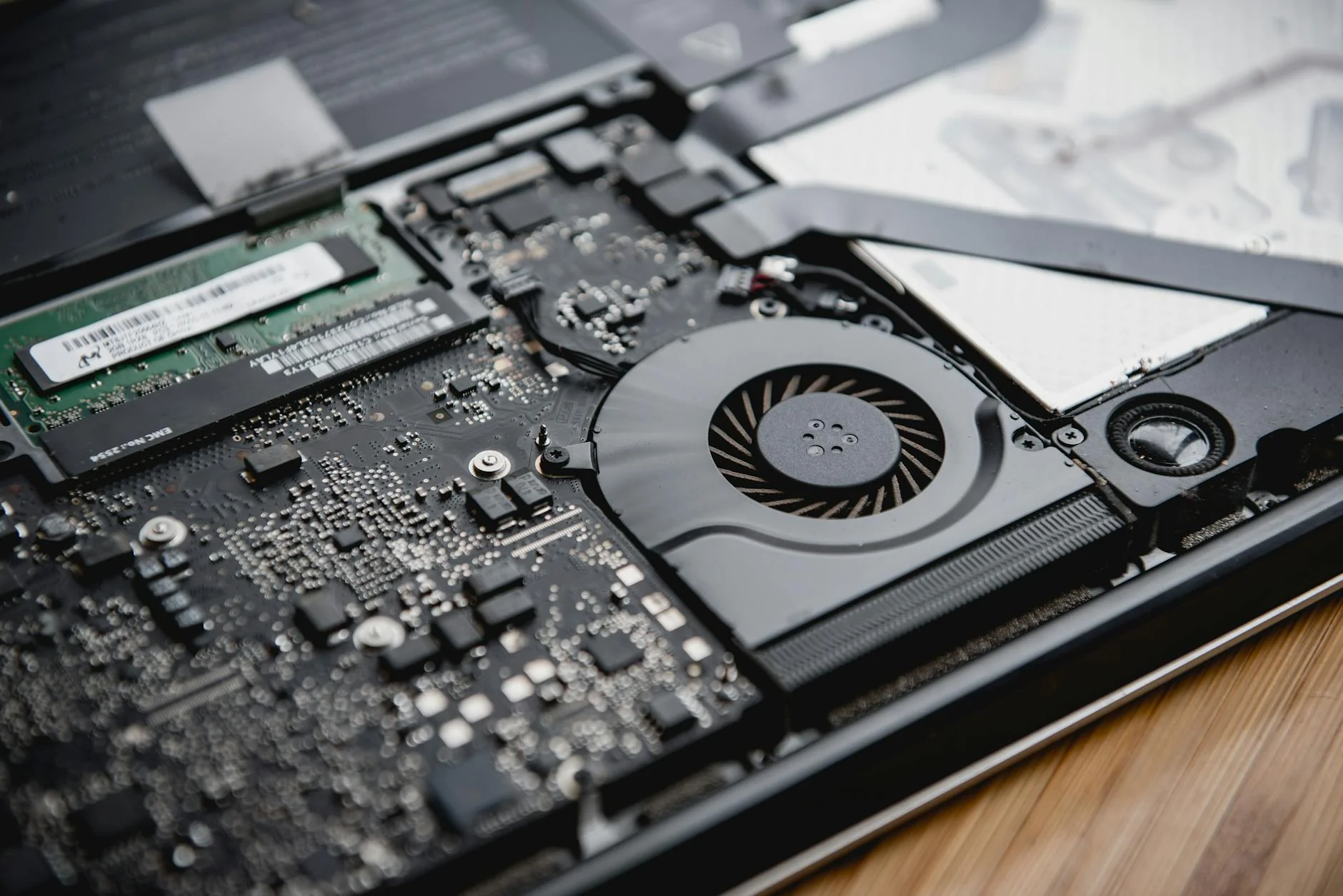 Dusty laptop fan cleaning illustrative graphic
