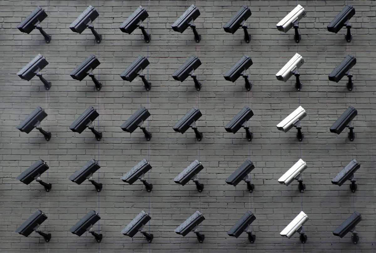 Monitoring wall displaying multiple surveillance feeds
